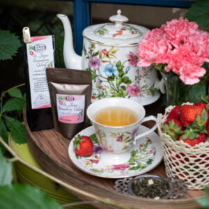 Online Tea Shop Loose Leave Oolong and Pouchong Tea - St. James Strawberry Oolong in a cup with strawberries