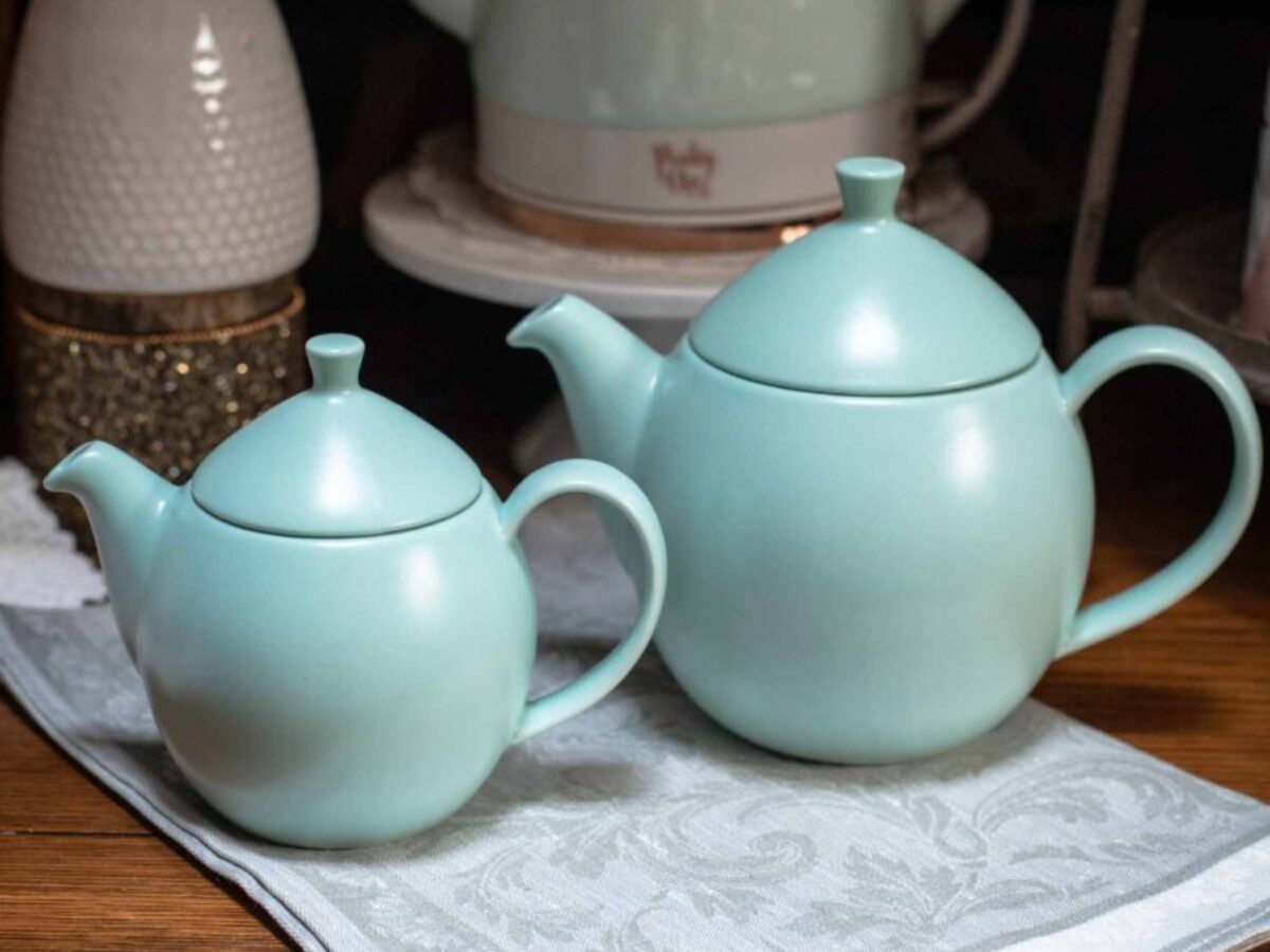 https://shop.stjamestearoom.com/wp-content/uploads/2023/07/Online-tea-Shop-Gifts-for-Tea-Lovers-Dew-Teapot-with-Basket-Infuser-14-oz.-and-32-oz.-Minty-Aqua-1200x900.jpg