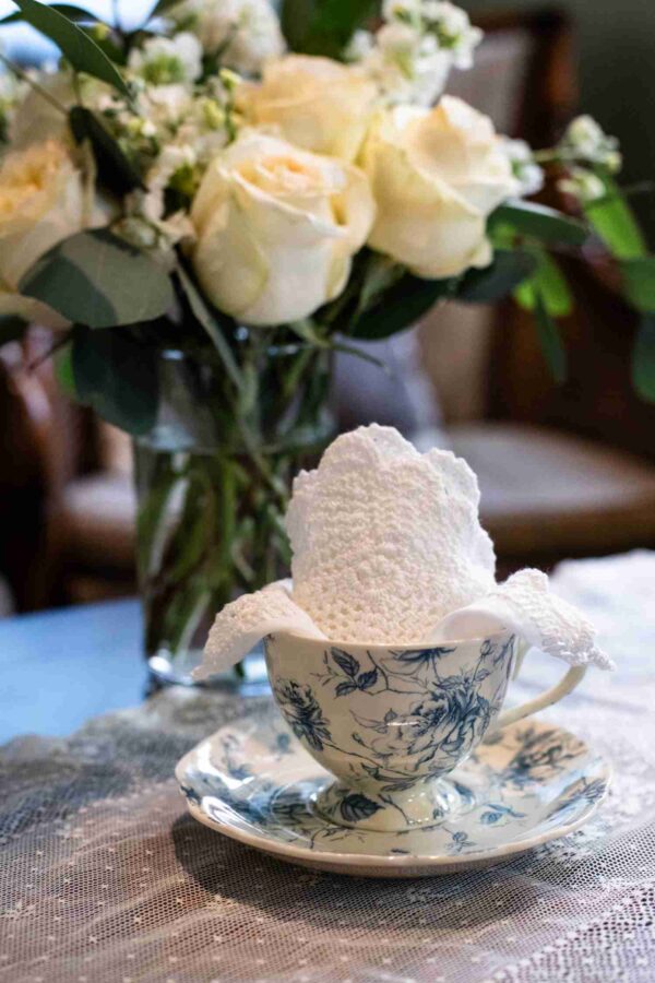 St James Online Tea Shop Scallop Crochet lace Tea Napkins in a blue and white cup